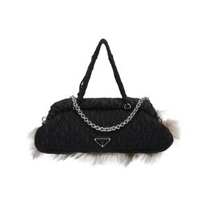 Prada bag triangle logo plate fur black